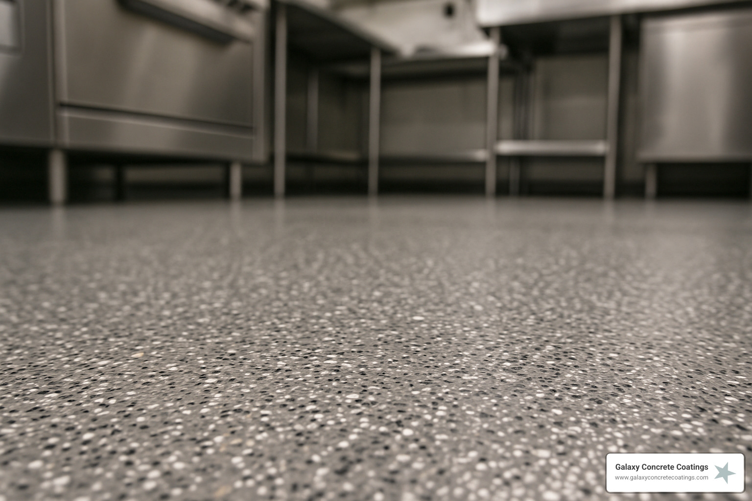 Close-up of slip-resistant aggregate in polyaspartic floor coating - commercial kitchen floor coatings Close-up of slip-resistant aggregate in polyaspartic floor coating - commercial kitchen floor coatings