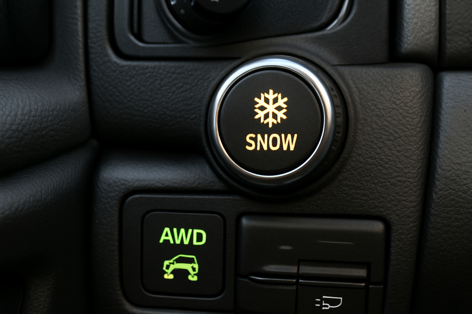 Dashboard showing snow mode selection and AWD indicator lights - best vehicles for snow