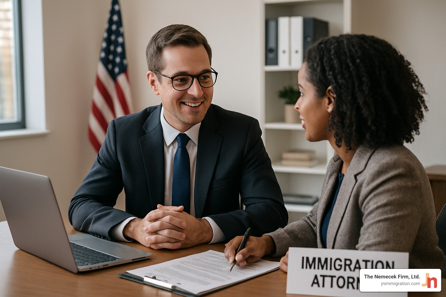client meeting with immigration attorney in professional office setting - immigration legal advice