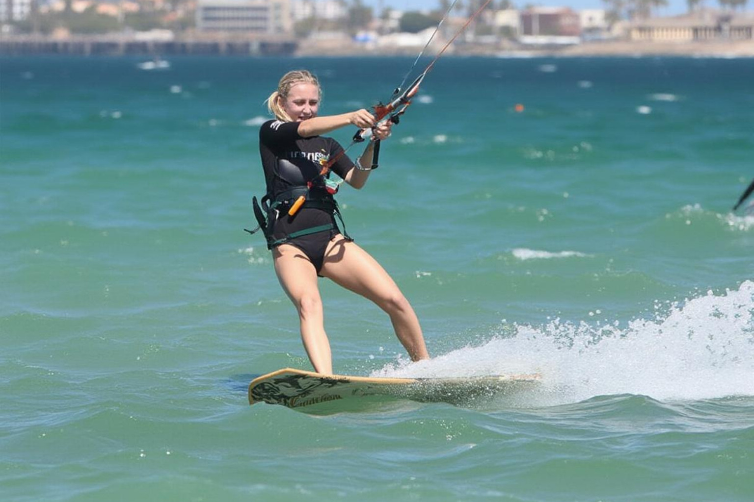Maika Monroe kiteboarding - maika monroe