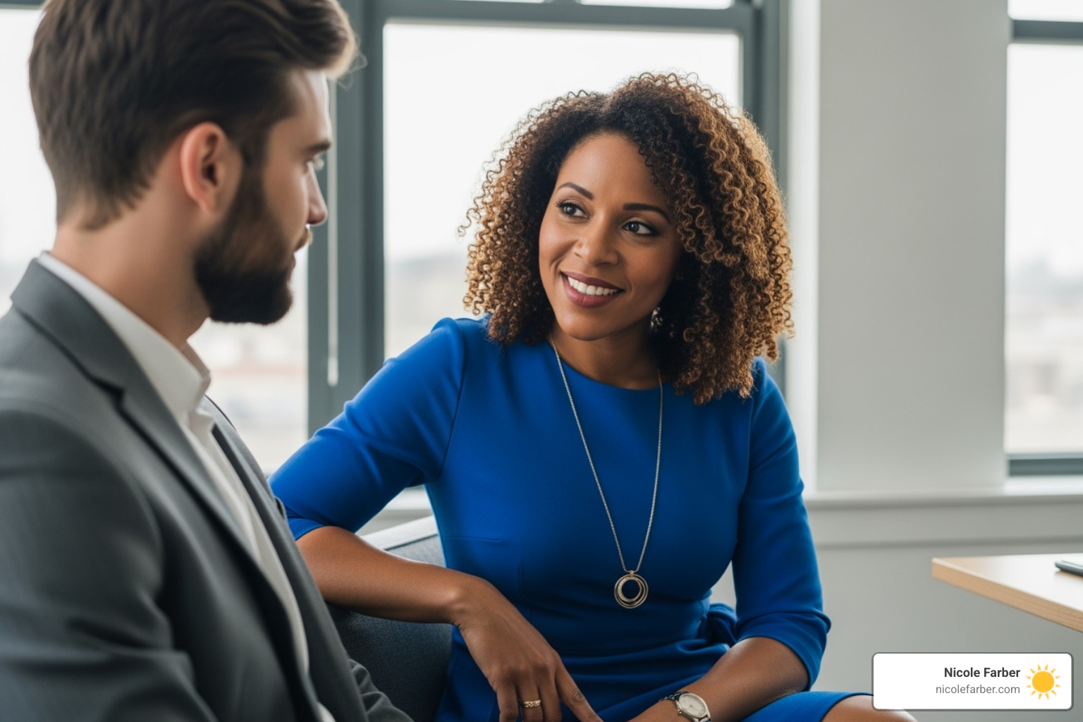 leader actively listening to a team member in a one-on-one setting - business leadership strategies
