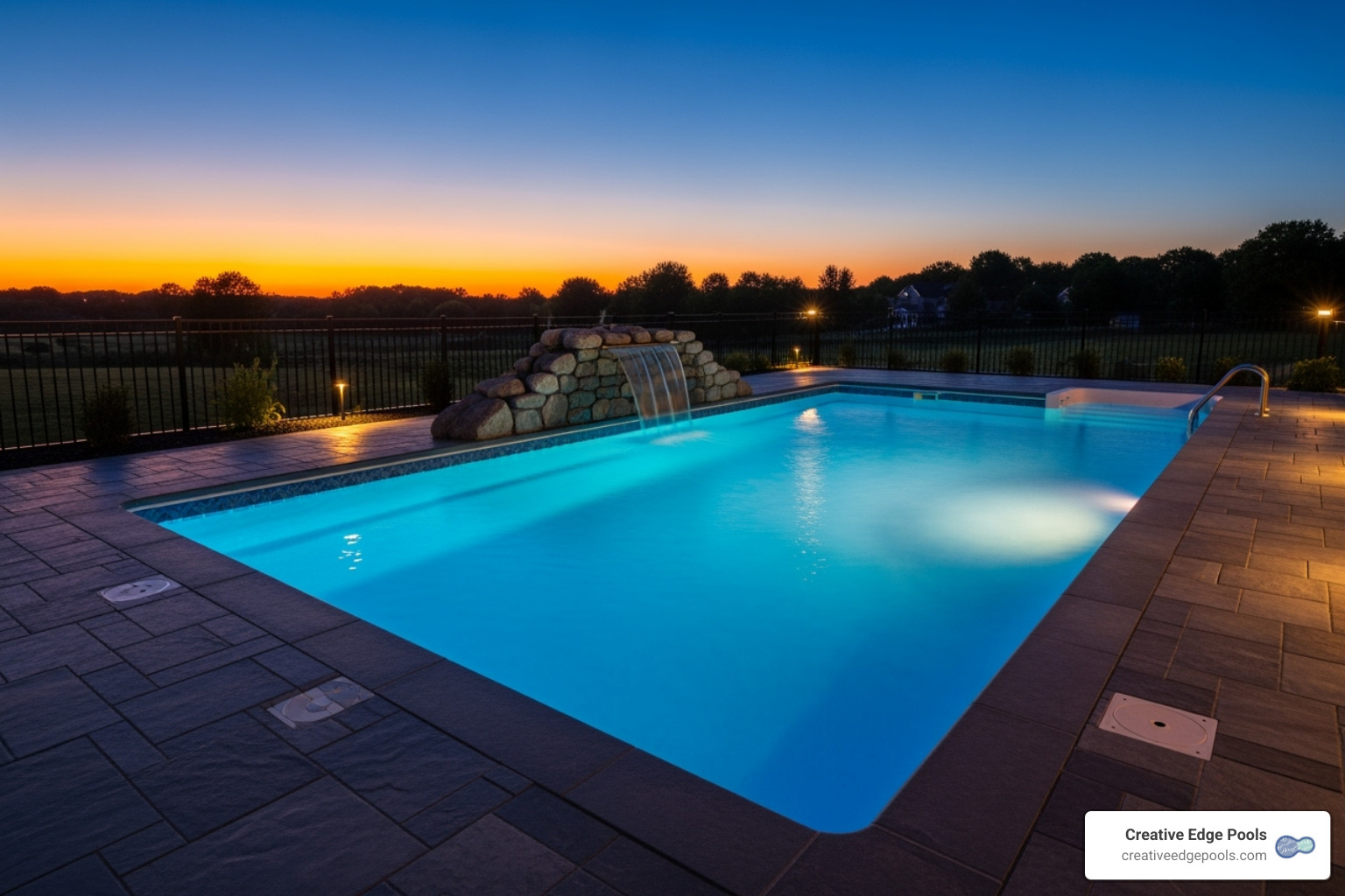 vinyl pool with a waterfall feature and LED lighting - inground vinyl pool prices installed