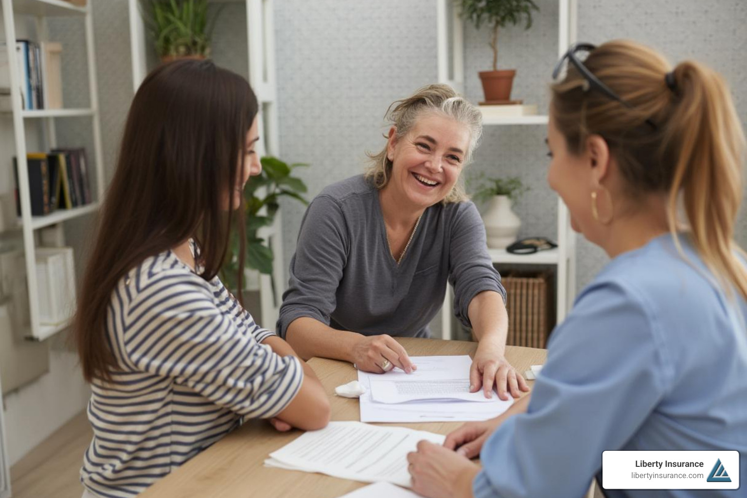 friendly insurance agent assisting a couple with paperwork - motorhome rv insurance