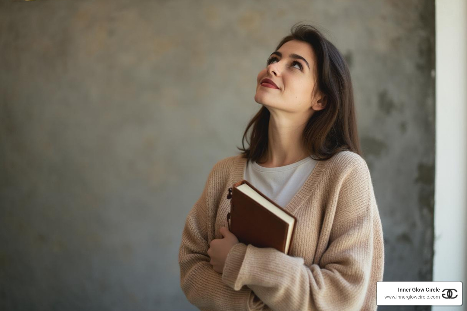 A single woman looking confidently towards the future, holding a journal. - icf coaching scholarship