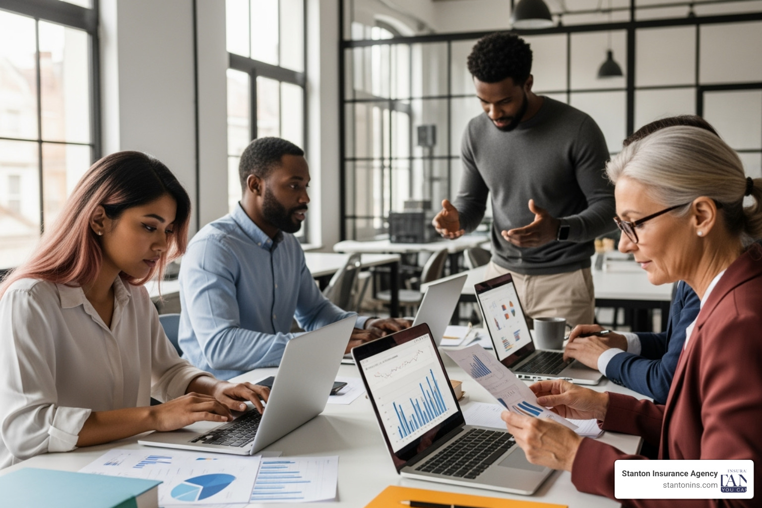 Professionals using laptops - cyber insurance coverage