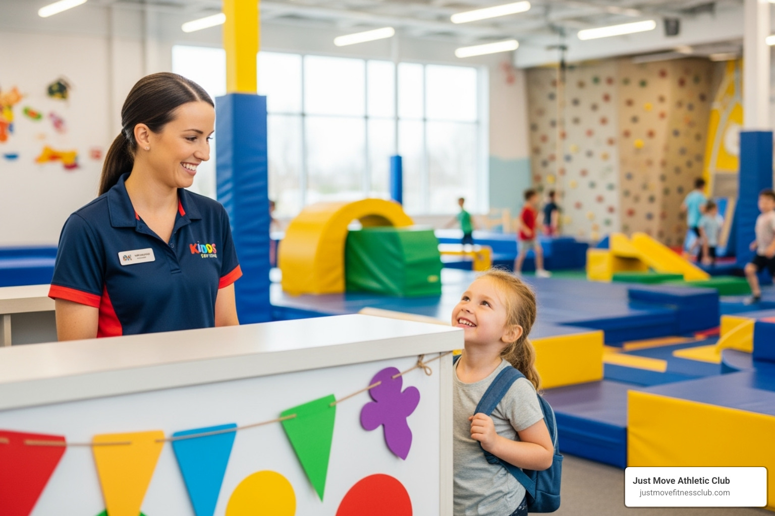 friendly staff checking child in - kids club gym