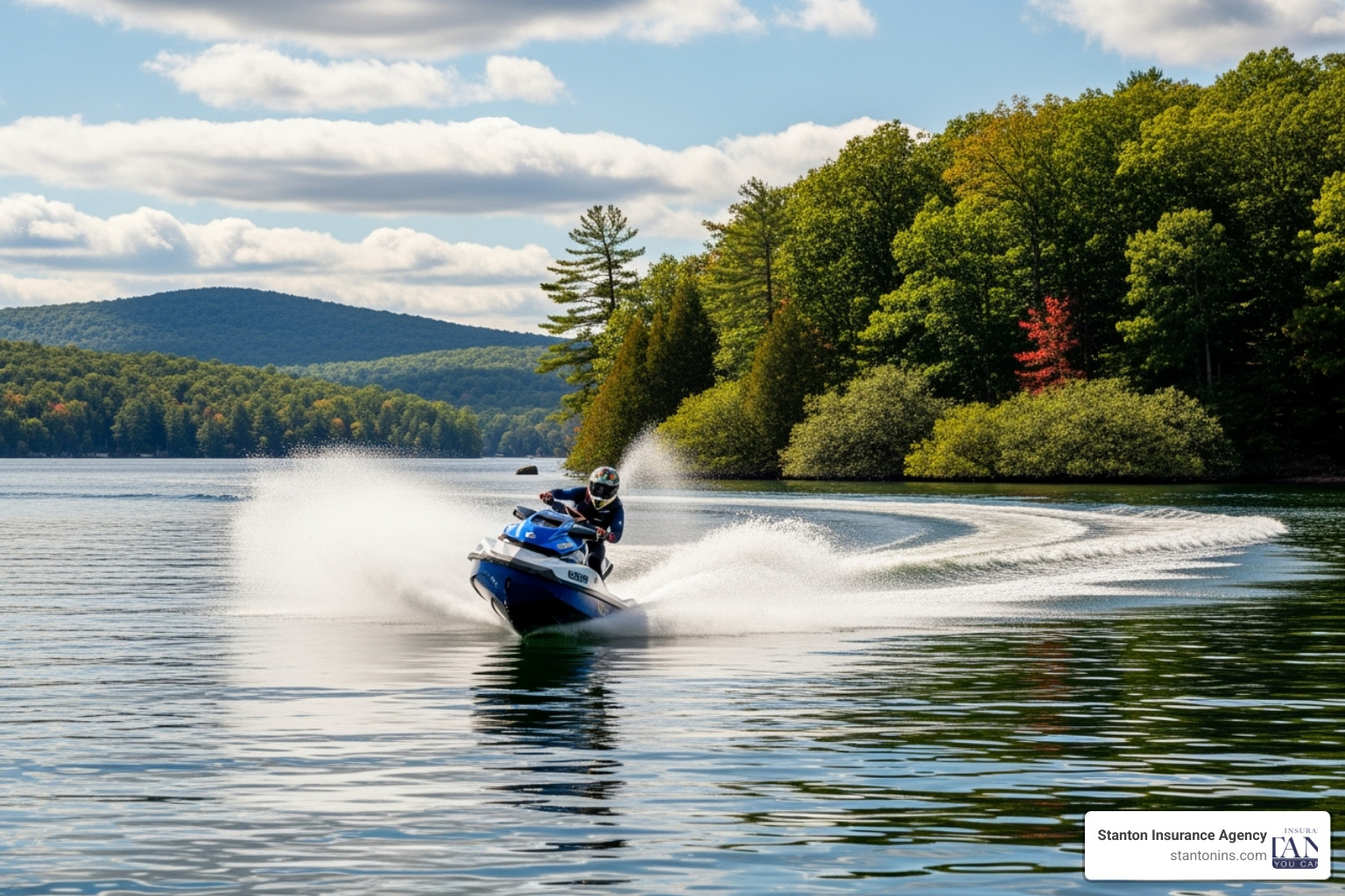 A personal watercraft (PWC) speeding across a New England lake - Boat Insurance A personal watercraft (PWC) speeding across a New England lake - Boat Insurance