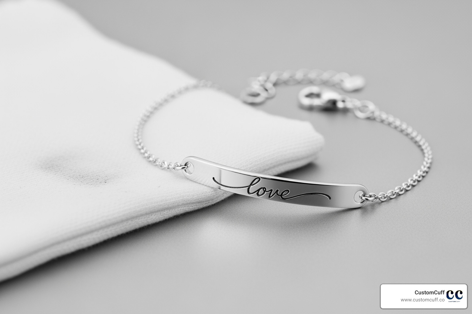 jewelry polishing cloth next to a sterling silver handwriting bracelet jewelry polishing cloth next to a sterling silver handwriting bracelet