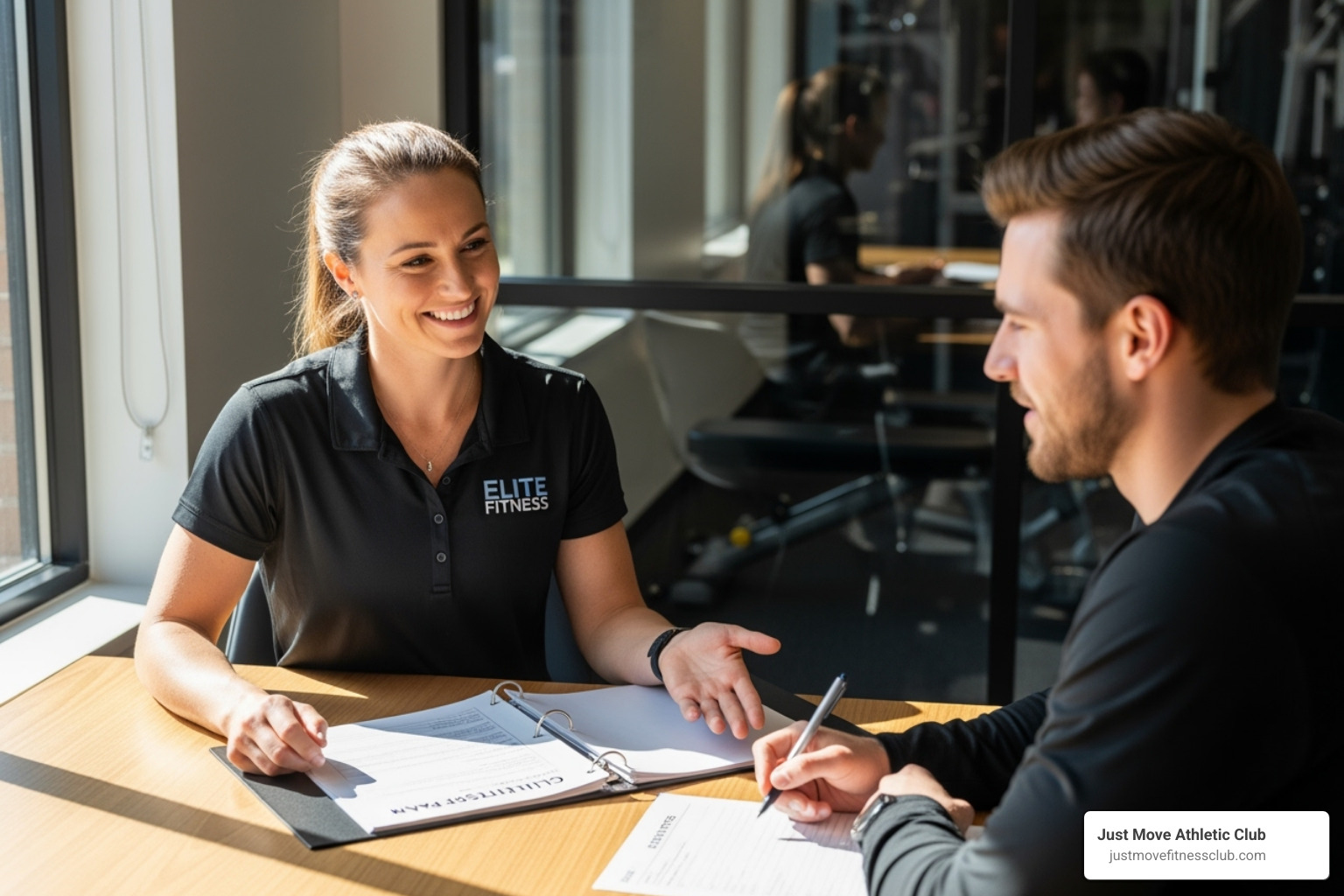 A friendly trainer conducting a consultation with a new client, both smiling and engaged in conversation. - private personal training sessions A friendly trainer conducting a consultation with a new client, both smiling and engaged in conversation. - private personal training sessions