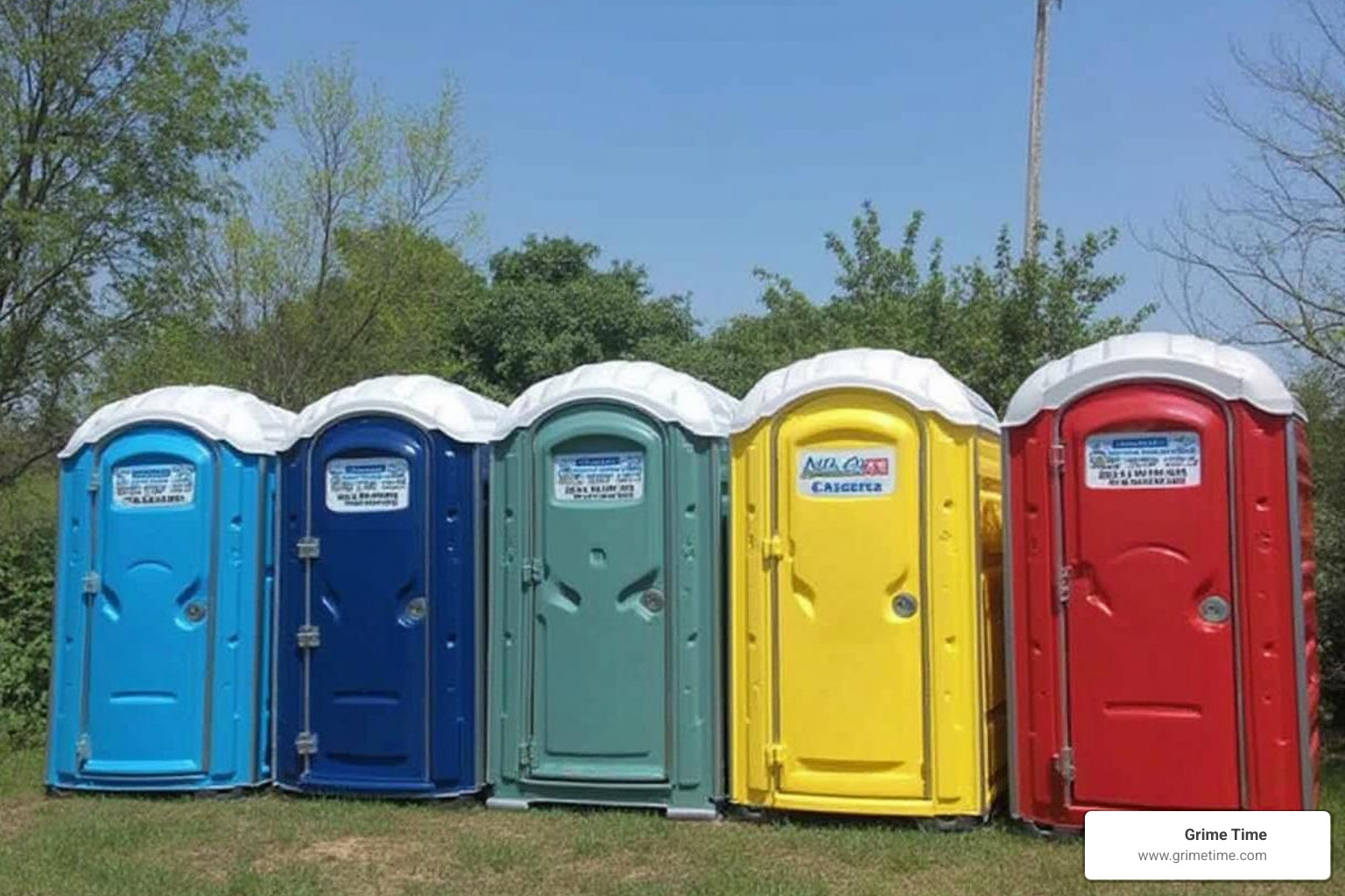 A lineup of different porta potty types: standard, ADA, and a deluxe flushing unit, illustrating the variety of options available for rent. - Affordable porta potty rental