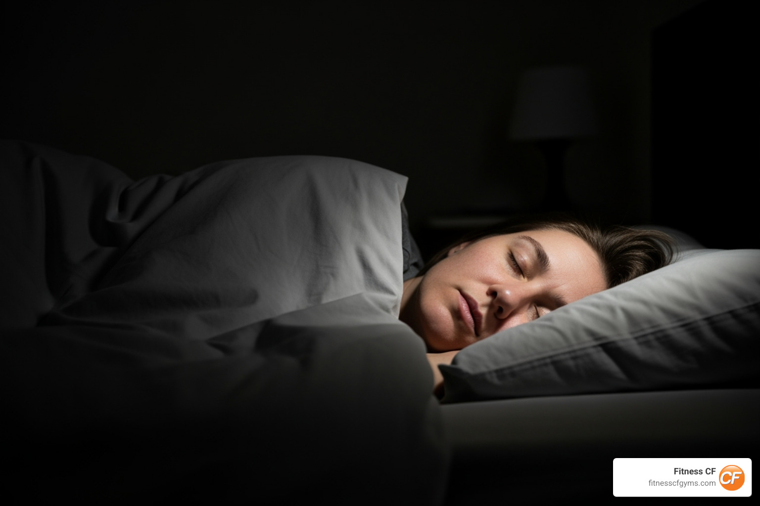 A person sleeping peacefully in a dark room - muscle building tips for fat guys