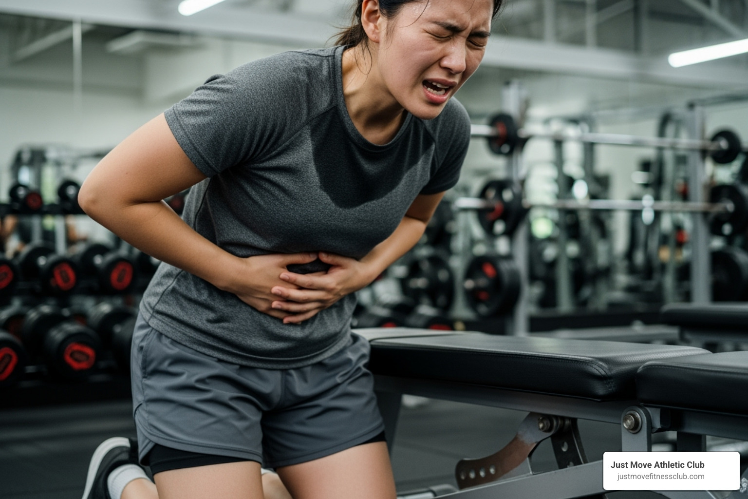 Someone looking uncomfortable at the gym after eating a large, greasy meal - Pre workout nutrition