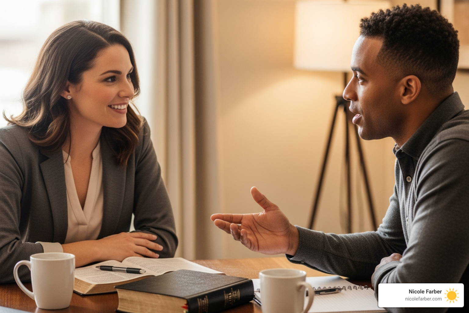 two people in a positive coaching session with a Bible on the table - christian life coaching