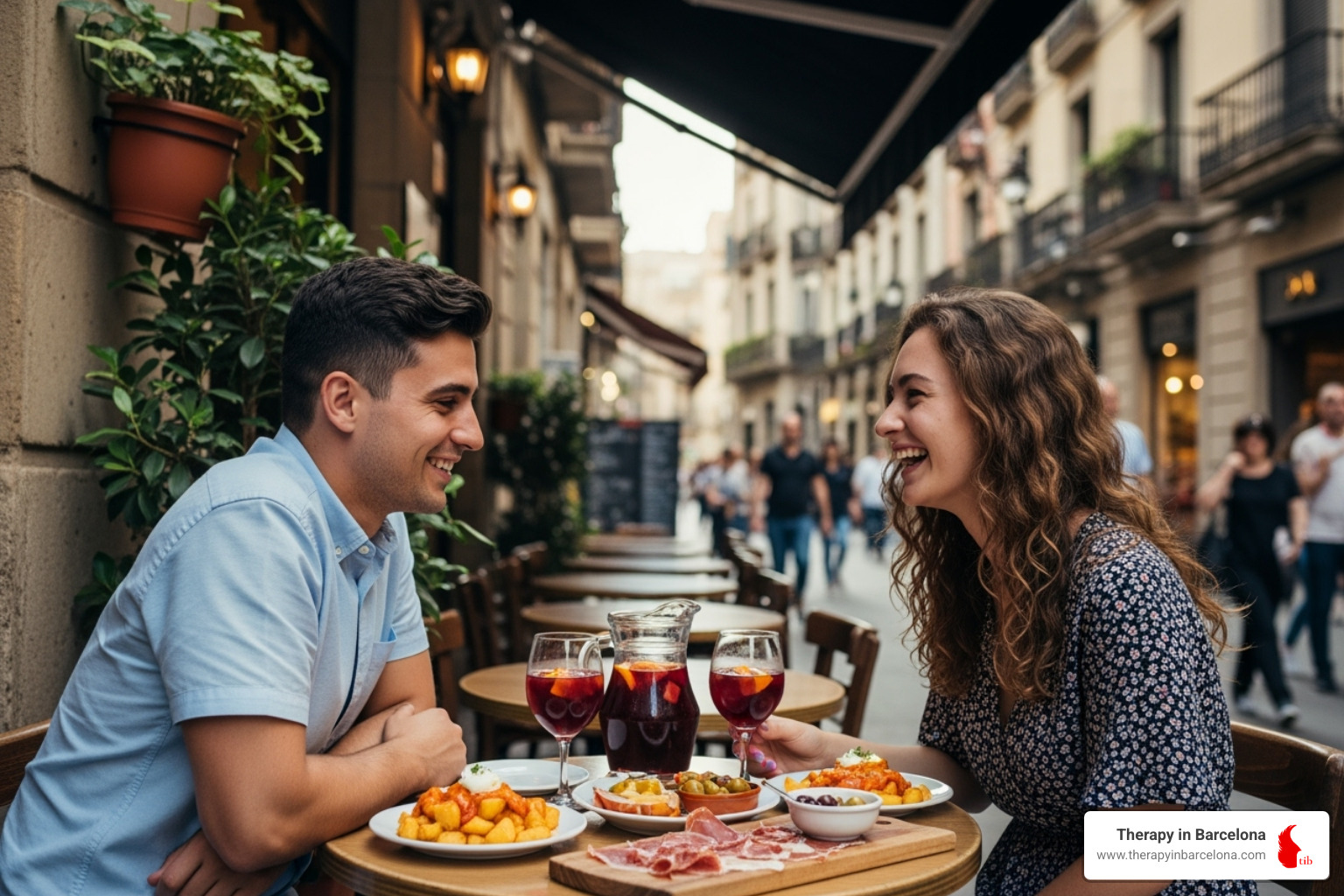A couple on a casual date in a Barcelona café, sharing tapas - Dating for international students A couple on a casual date in a Barcelona café, sharing tapas - Dating for international students