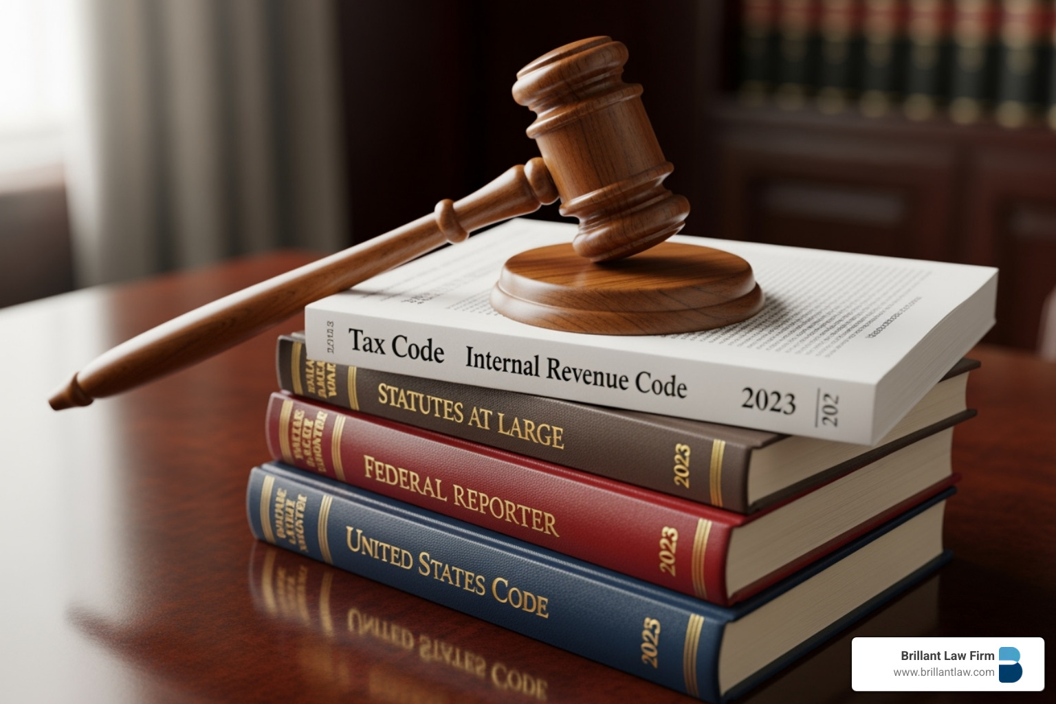 A gavel resting on a tax code book, symbolizing the legal authority of a tax attorney in tax disputes