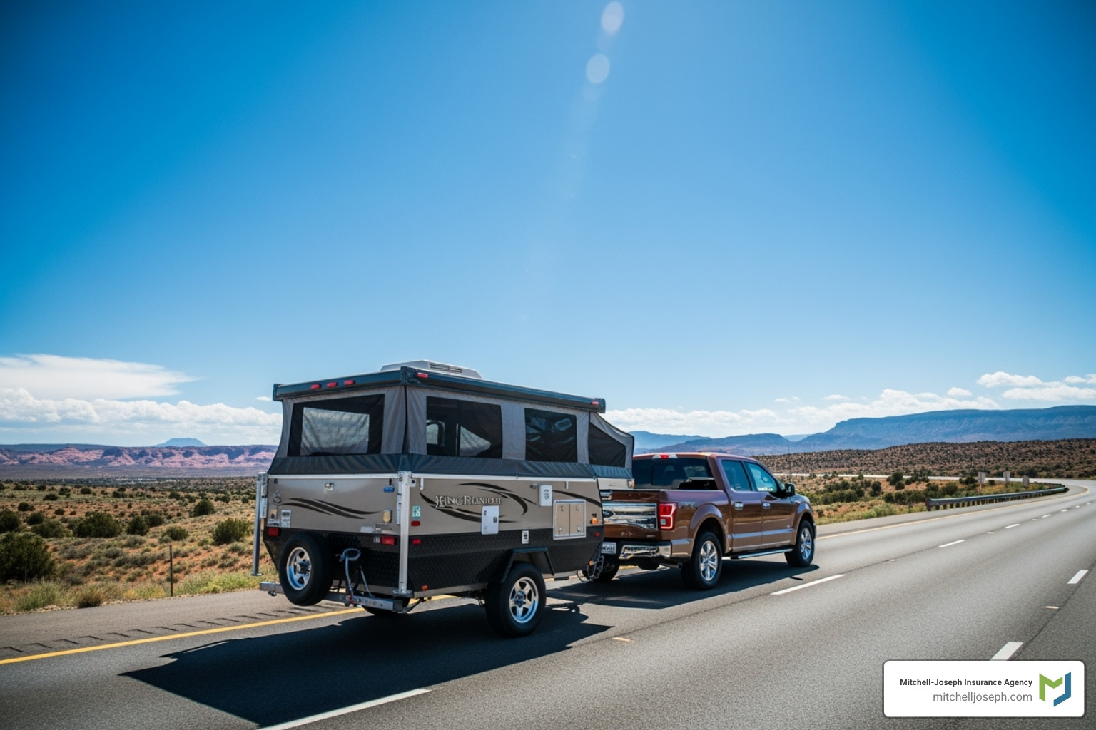 pop-up camper being towed safely on a highway - do you have to insure a pop up camper