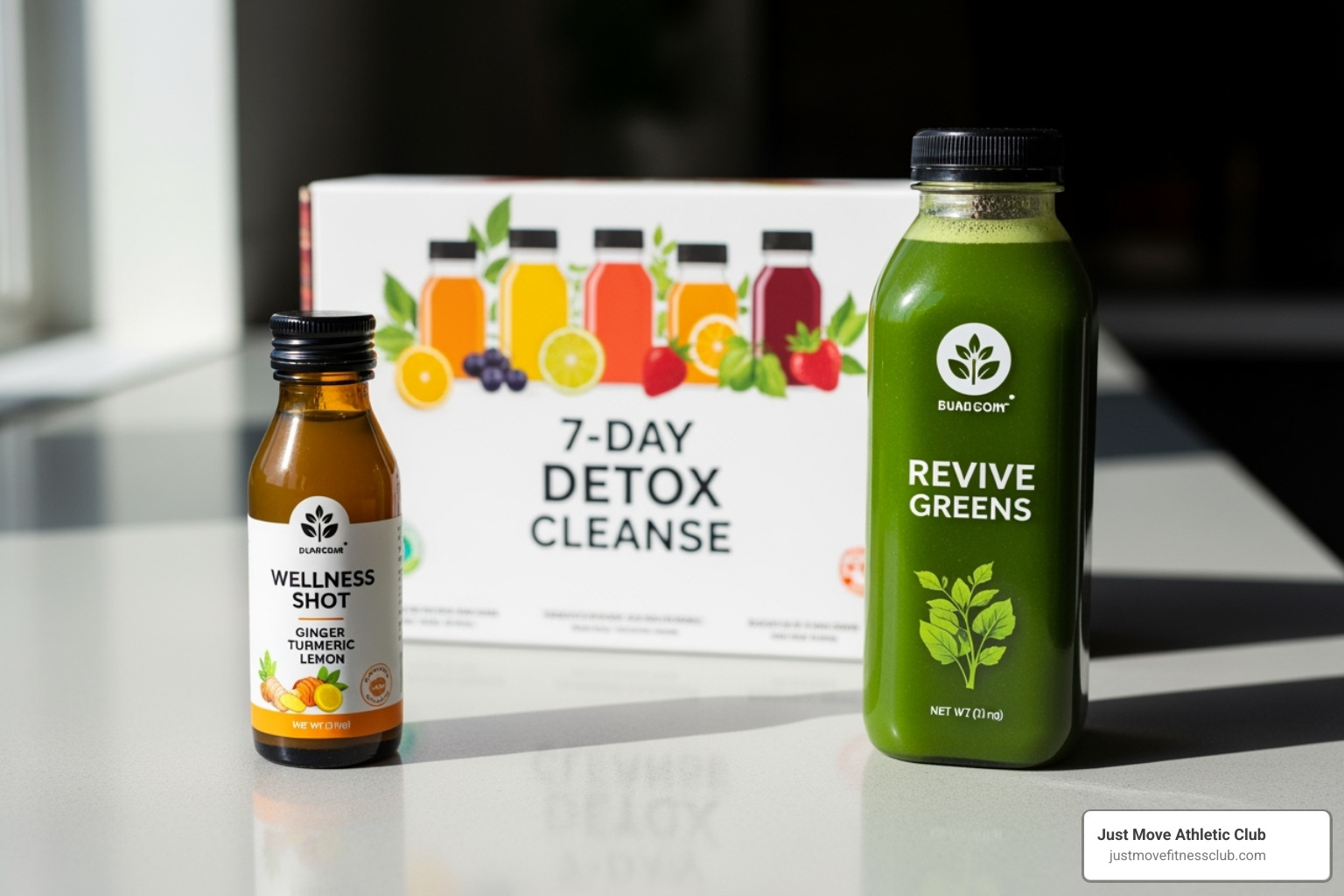 Image of a wellness shot, a large juice bottle, and a juice cleanse box arranged together - Fresh pressed juices