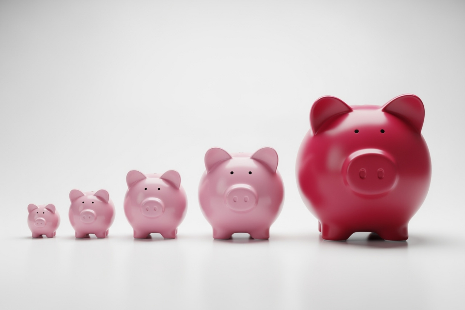 a piggy bank growing larger over time, representing savings and growth - 5starsstocks.com passive stocks
