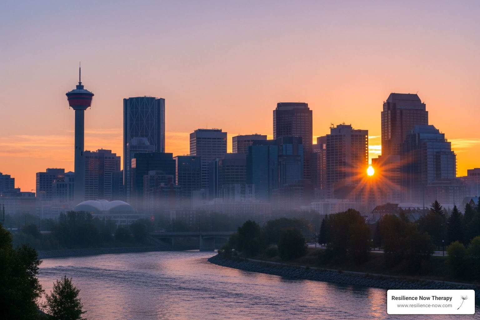 A serene sunrise over the Calgary skyline, symbolizing hope, healing, and new beginnings - trauma therapy Calgary