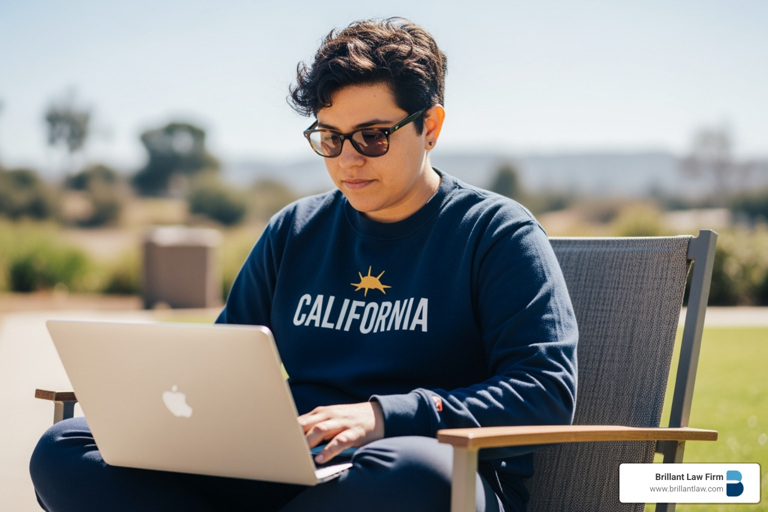 A person uses a laptop to search for legal aid providers in California, with a sunny window in the background.