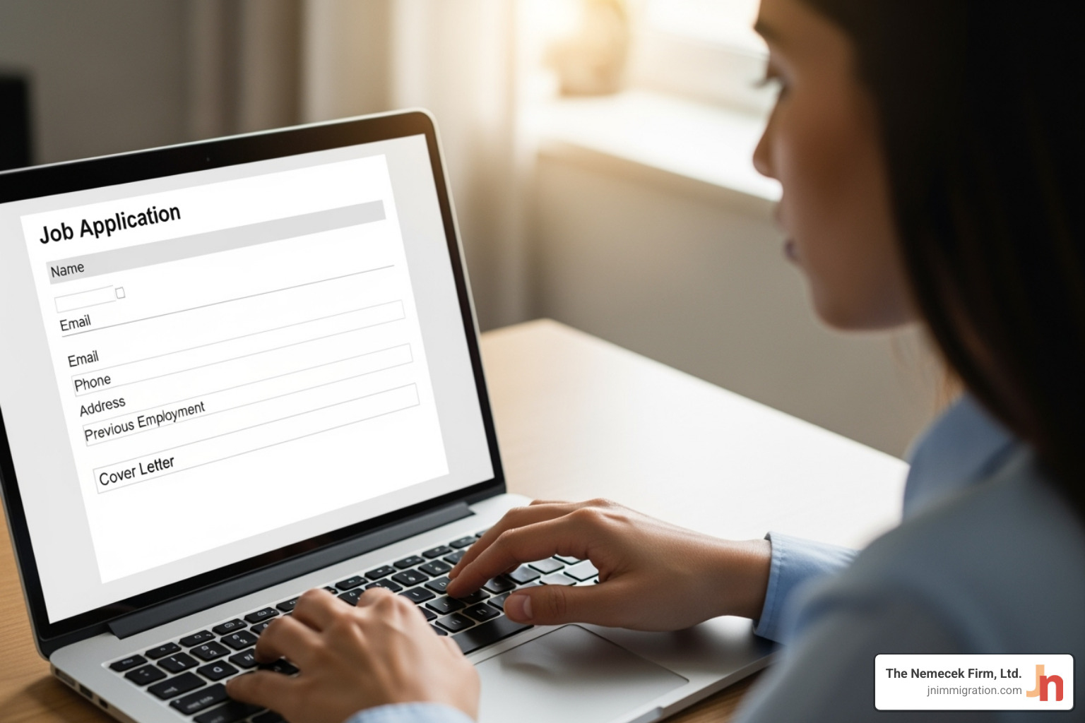 person filling out an online application form on a laptop - US visa application help