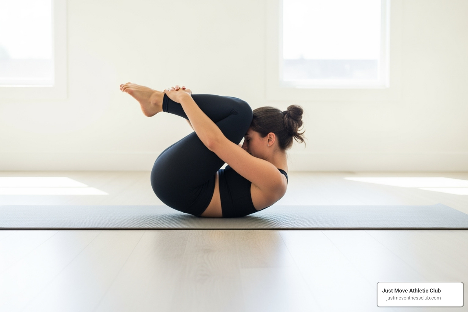 Image of a person in the 'ball' shape for the Rolling Like a Ball exercise - Pilates for core stability