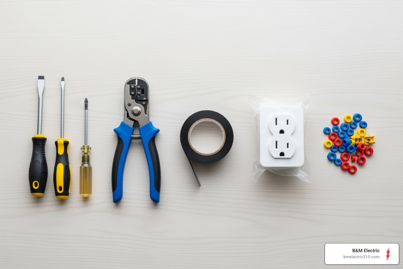 Tools and materials needed for GFCI outlet install laid out neatly - GFCI outlet install