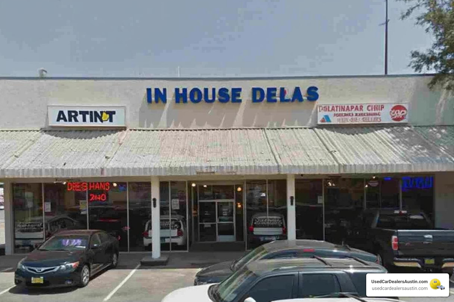 mechanic performing a multi-point inspection on a used SUV - in house financing car dealers austin tx