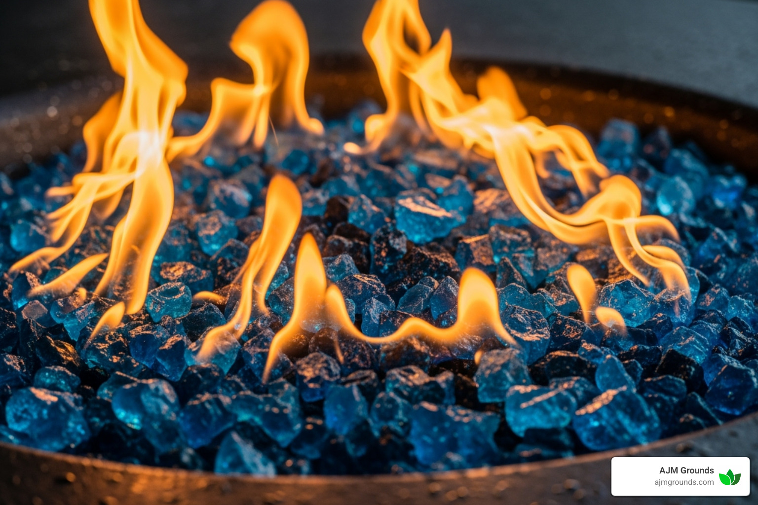 close-up shot showcasing vibrant blue fire glass in an active fire pit - Natural gas firepit