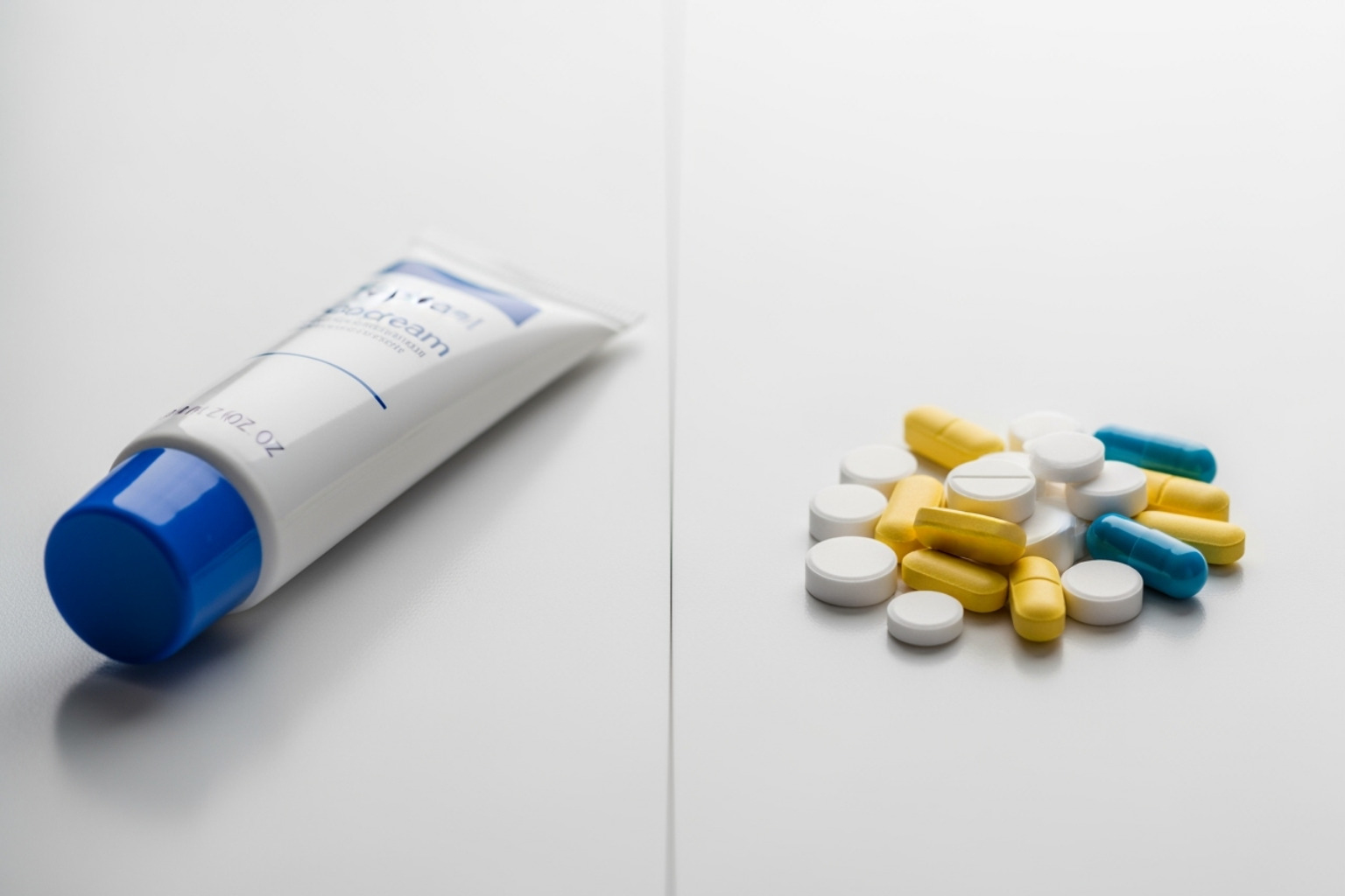 a topical cream on one side and oral pills on the other - anti inflammatory cream