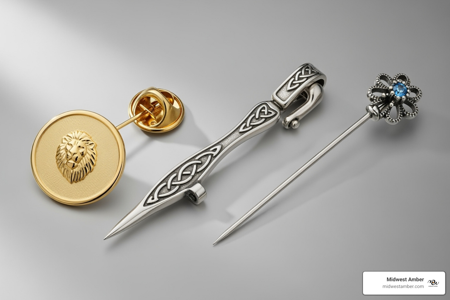 various pin types side-by-side: a lapel pin, a kilt pin, and a stick pin - sterling silver pin