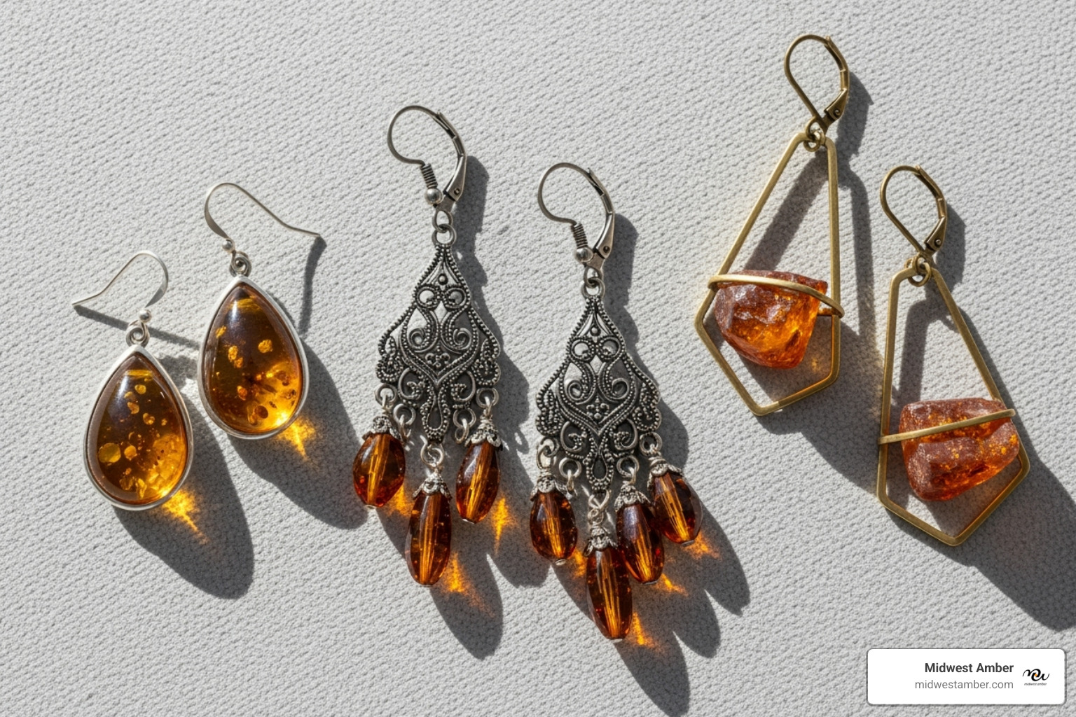 A collection of amber drop earrings in various styles, including neat teardrops, intricate chandeliers, and modern geometric designs - Amber drop earrings