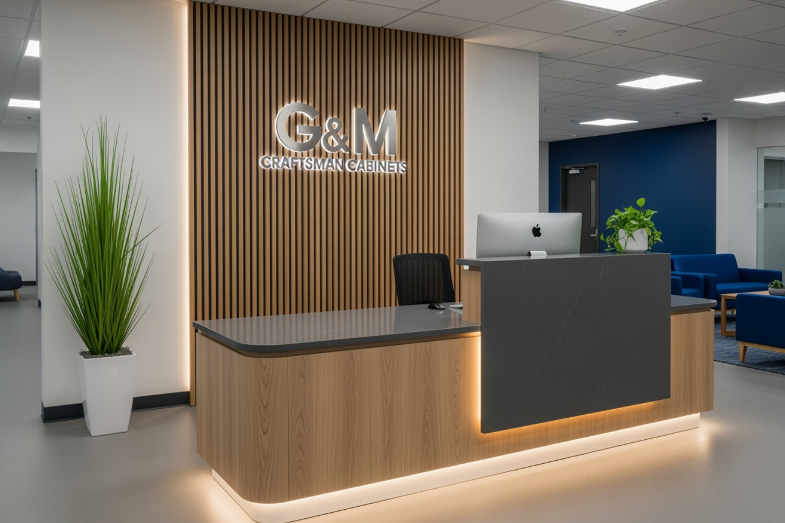 A professional and stylish commercial reception desk designed by G&M Craftsman Cabinets - bespoke storage solutions