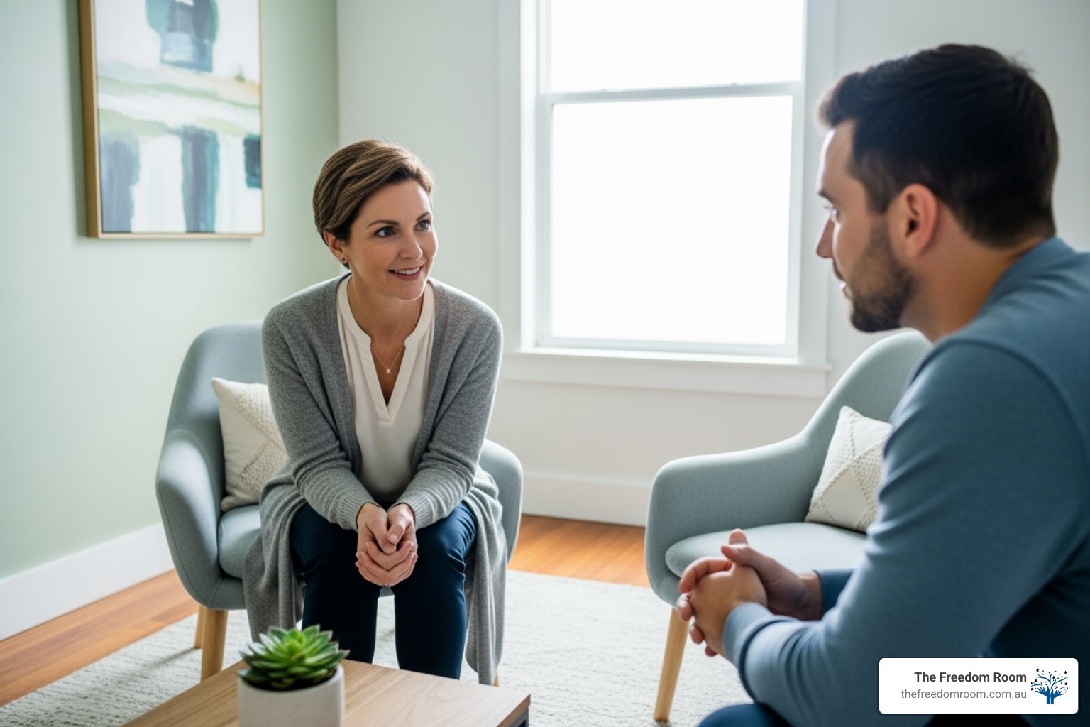 A compassionate therapist talking with a client in a calm, supportive setting - addiction treatment options