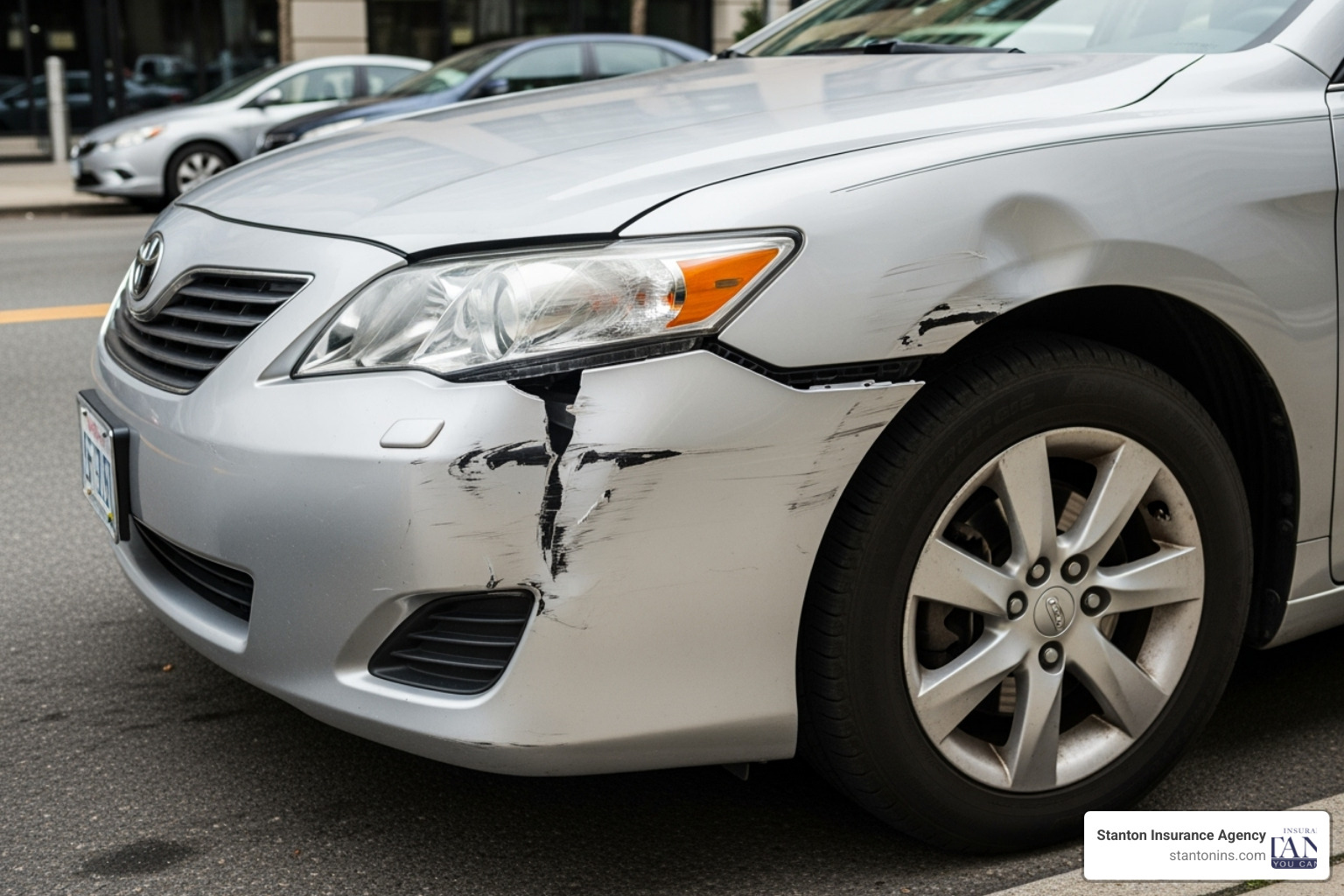 Car after a fender bender with visible damage - Collision vs Limited Collision