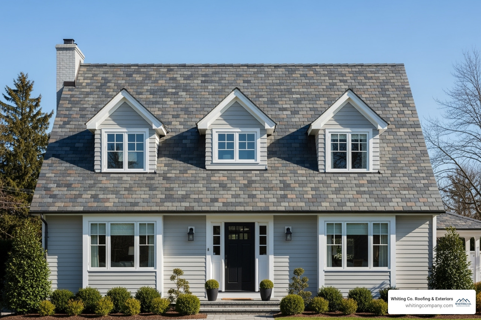 Neat home with a natural slate tile roof - durable roofing solutions