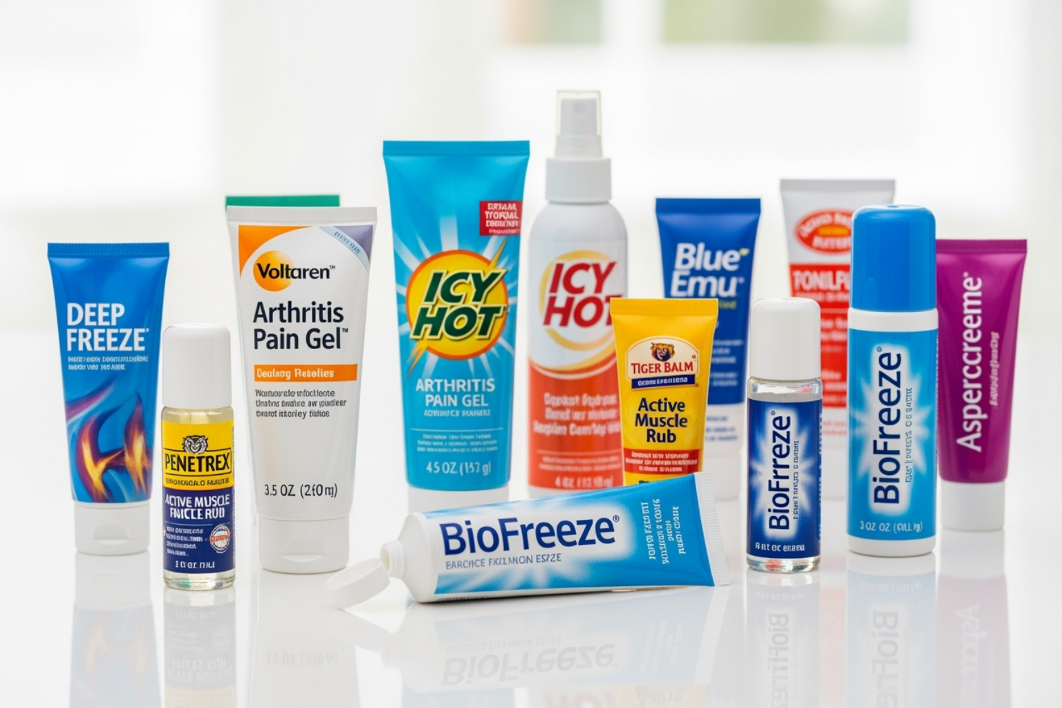 Collection of different topical pain relief product formats including cream tubes, gel roll-ons, and sprays - topical cream for muscle aches