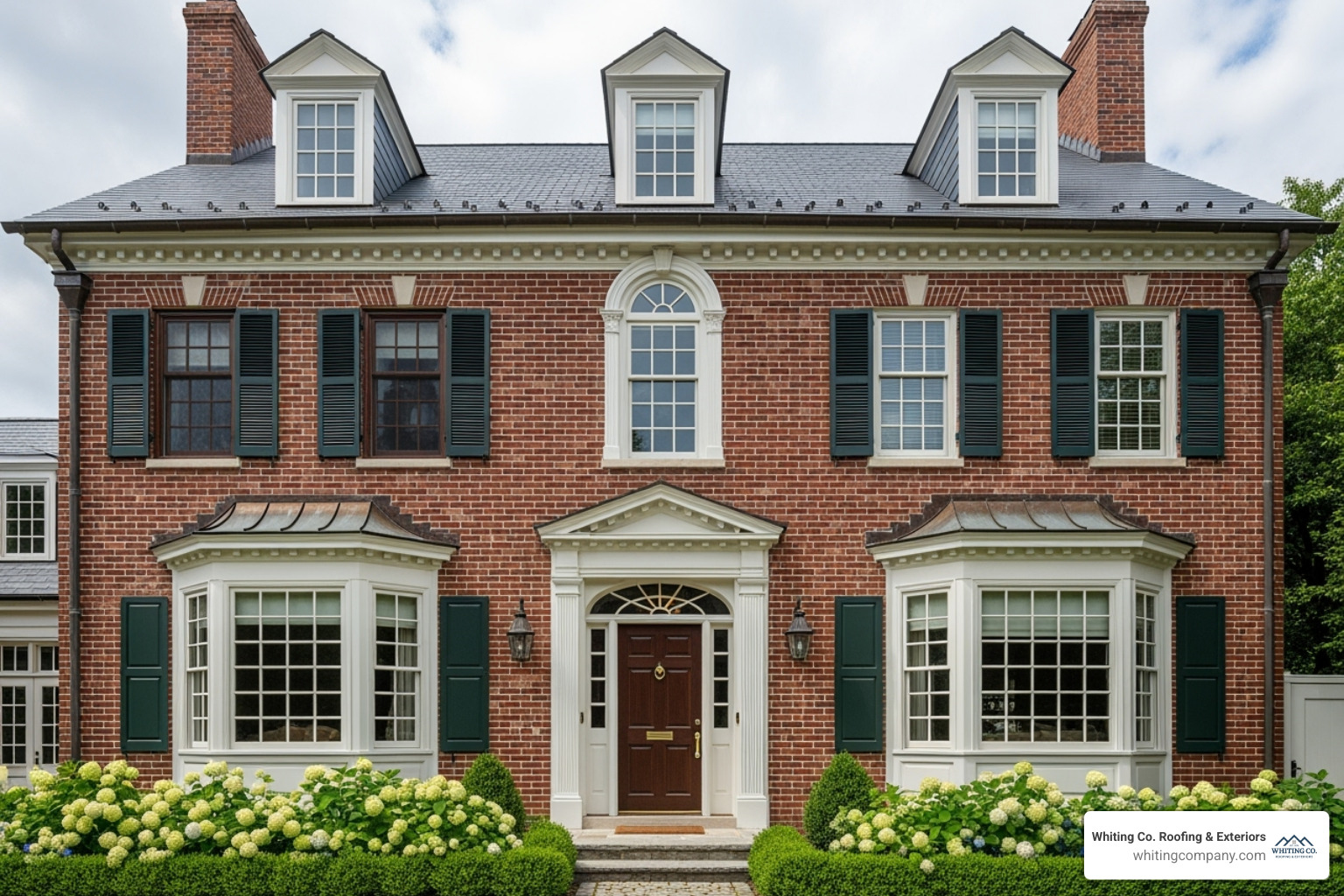 Different window styles on a colonial-style home in Annapolis, showcasing how new windows can complement historical architecture - Window replacement Annapolis
