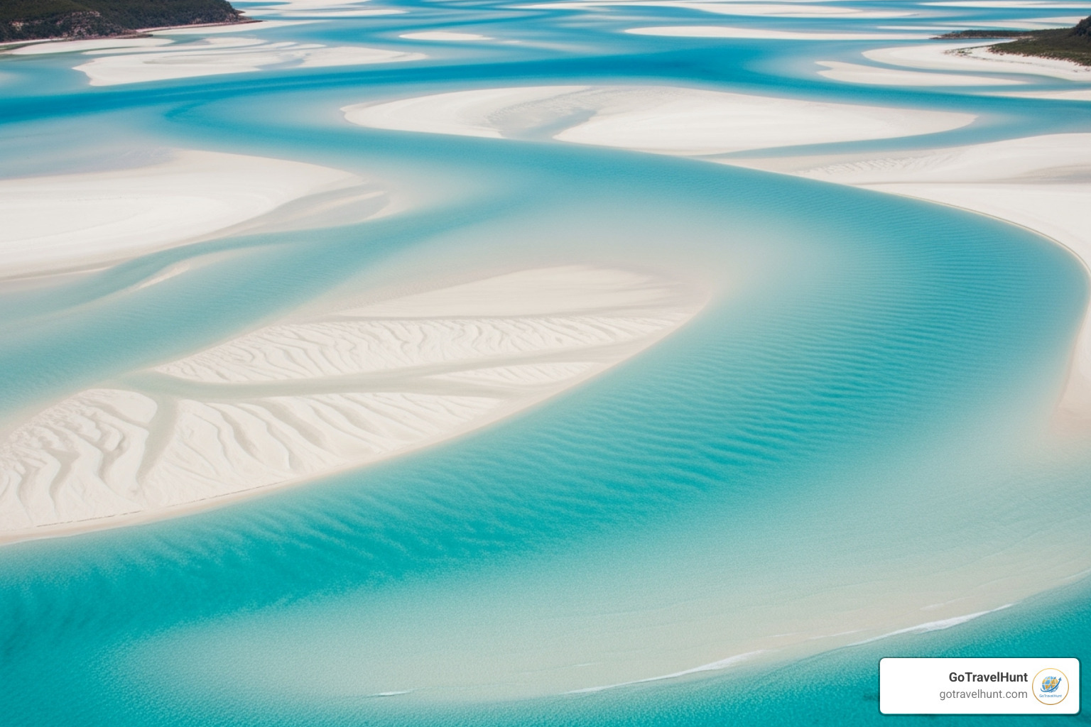 swirling sands of Whitehaven Beach from Hill Inlet - tropical vacation destinationsโ swirling sands of Whitehaven Beach from Hill Inlet - tropical vacation destinationsโ