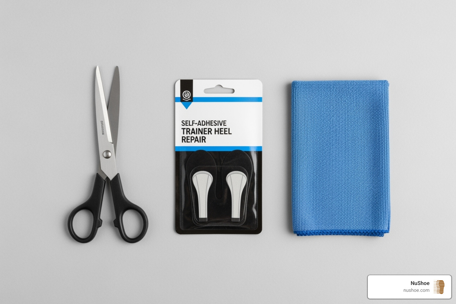 Supplies for trainer heel repair: patches, scissors, clean cloth - trainer heel repair patch