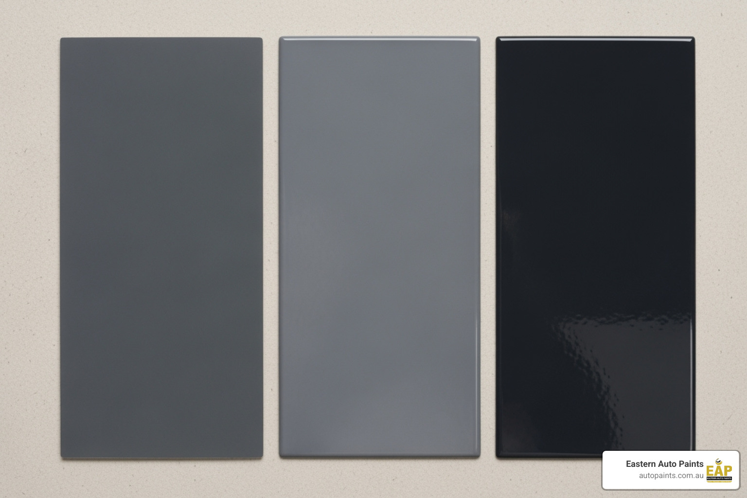Three finished sample panels showing the difference between matte, satin, and gloss finishes, key types of clearcoat sheen options.