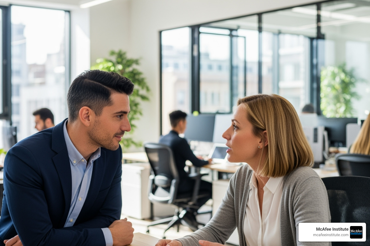 Team leader actively listening to an employee in an open office environment - building trust and accountability in investigations Team leader actively listening to an employee in an open office environment - building trust and accountability in investigations