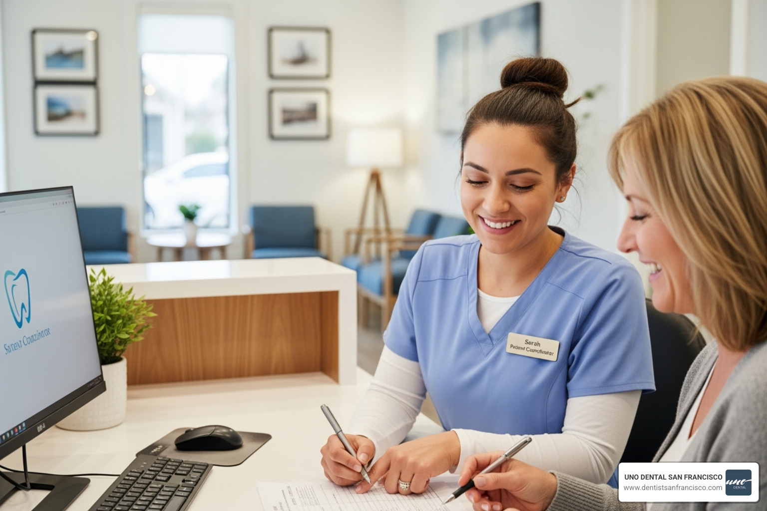 friendly front office team member assisting a patient with paperwork - SF dental office friendly front office team member assisting a patient with paperwork - SF dental office