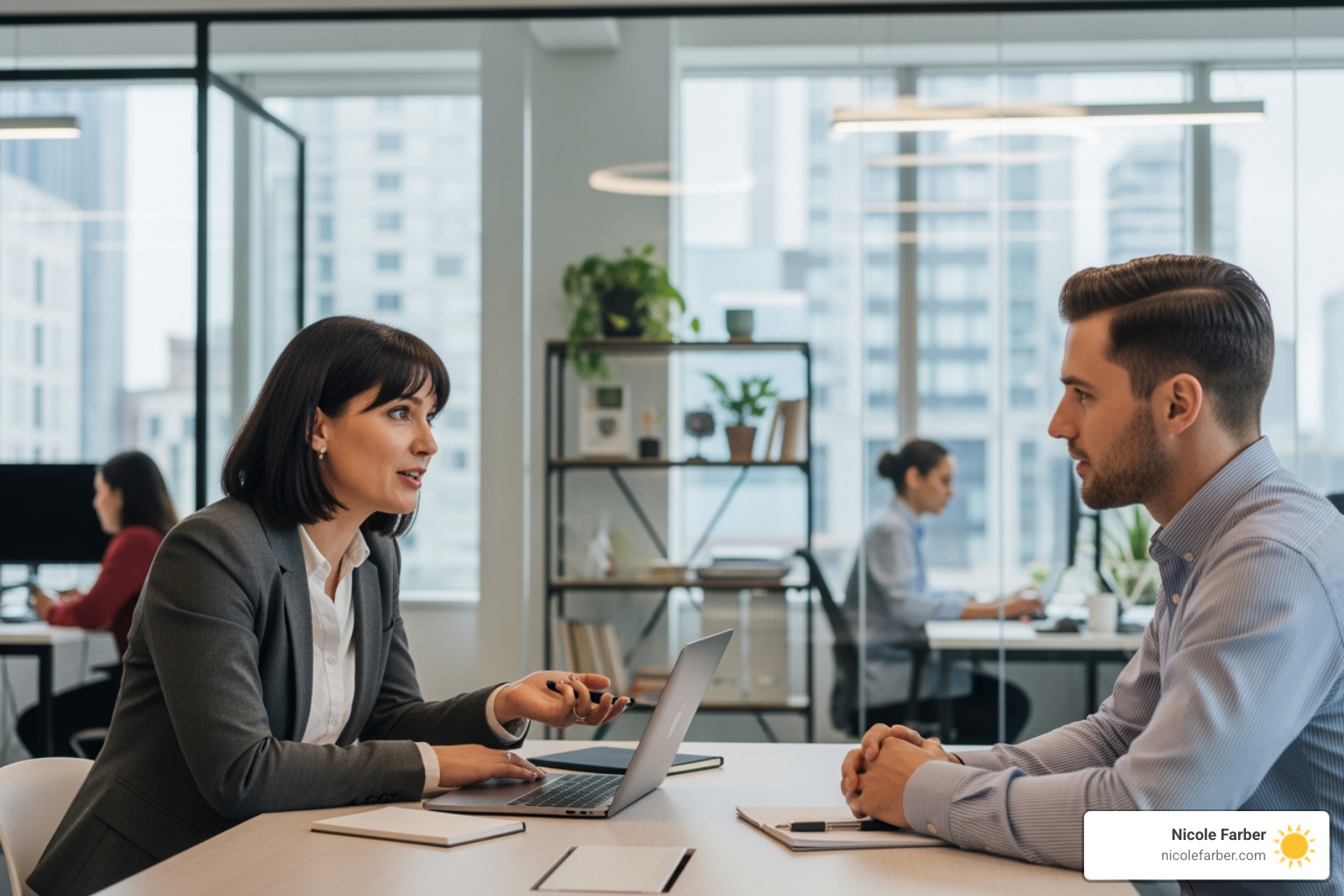 A leader in a one-on-one coaching session with a team member, both actively engaged in a Luzerne County or Antigua Guatemala office. - Business leadership strategies