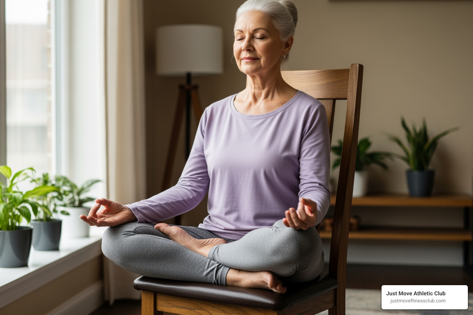 senior performing a seated yoga pose in a chair - yoga for aged beginners