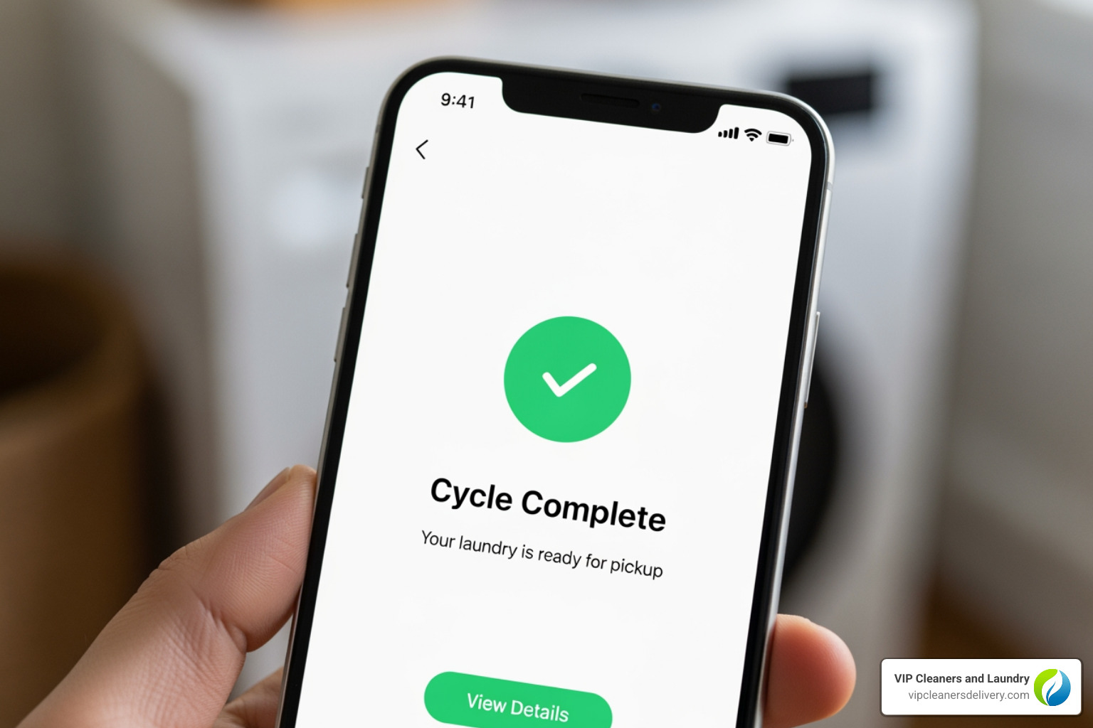 phone screen showing a "Cycle Complete" notification - wash laundry mobile