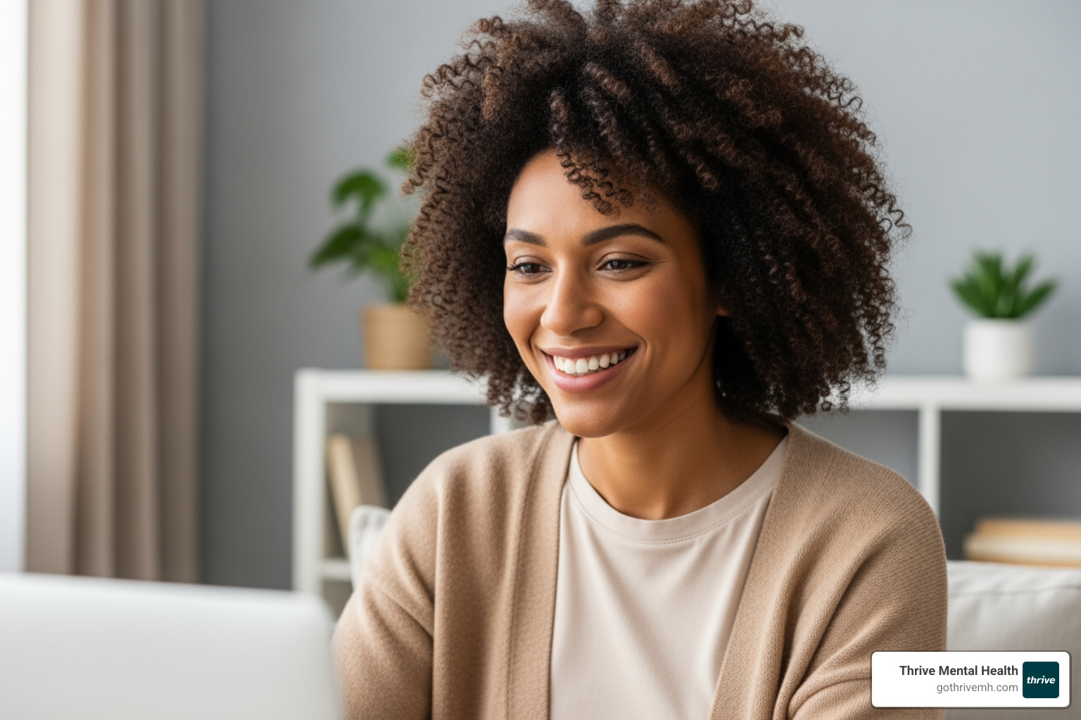 Patient smiling during a virtual therapy session, demonstrating comfort and engagement - virtual behavioral health Patient smiling during a virtual therapy session, demonstrating comfort and engagement - virtual behavioral health