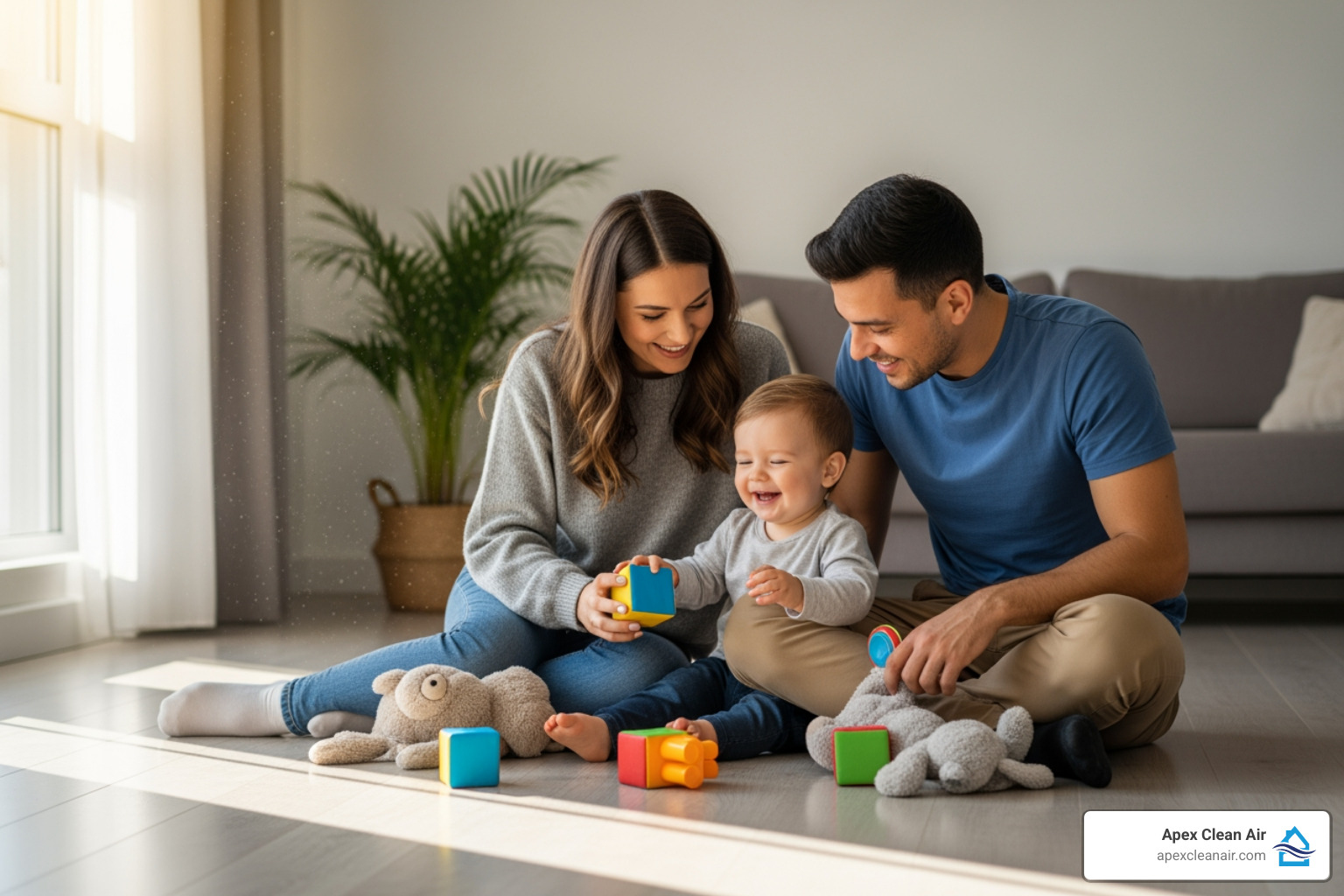 family with a young child playing on a clean floor - air ventilation cleaning services