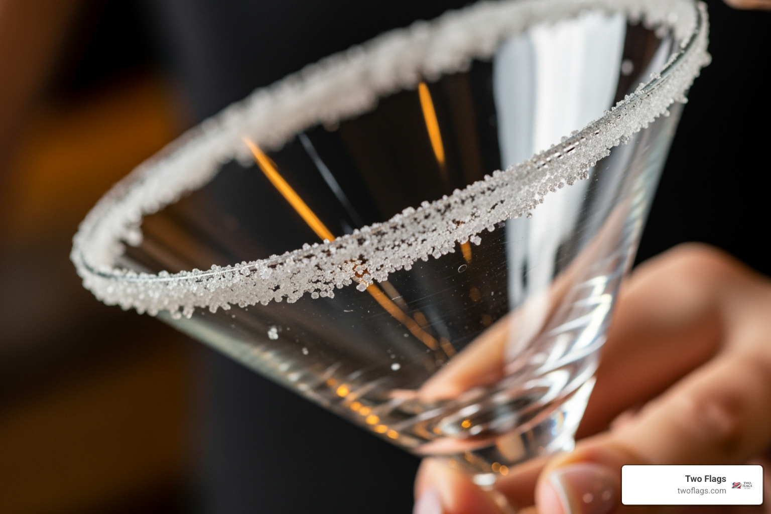 Martini glass being rimmed with sugar - lemon drop martini sour mix