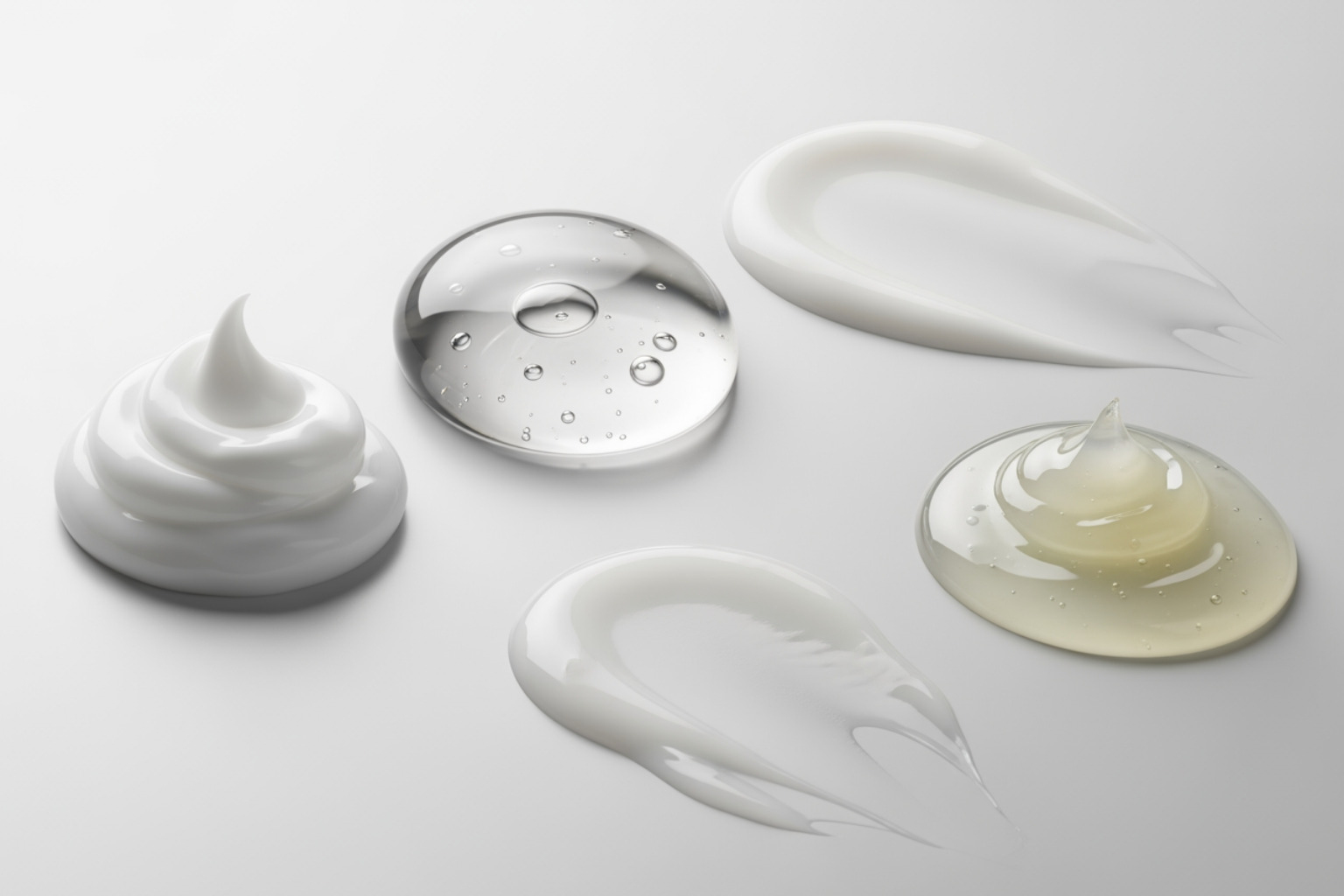 different cream textures on a surface (e.g., a thick cream, a clear gel, a lotion, an ointment) - muscle joint cream different cream textures on a surface (e.g., a thick cream, a clear gel, a lotion, an ointment) - muscle joint cream